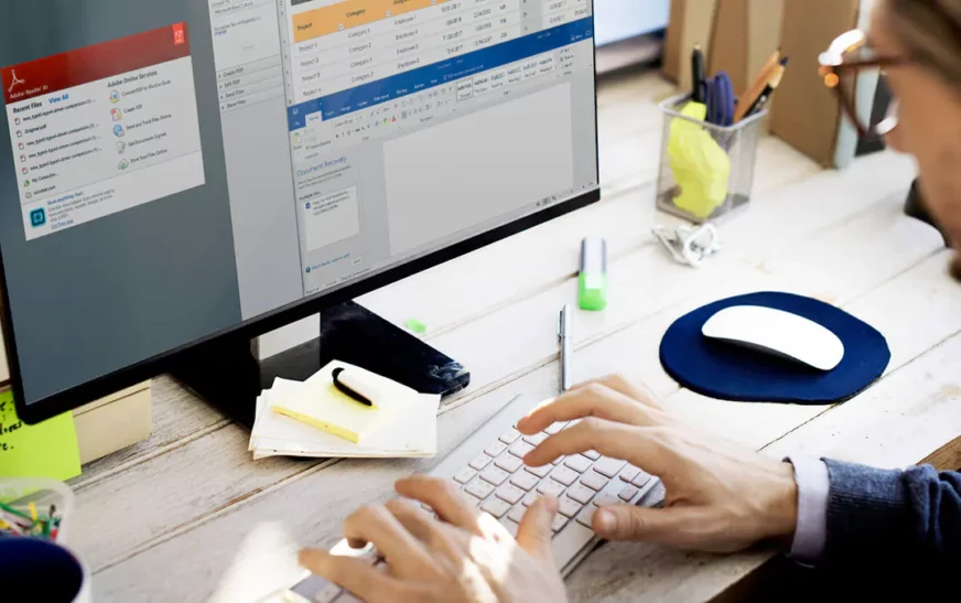 Person working on computer with spreadsheets and documents reviewing Orformi.ru platform security and legitimacy