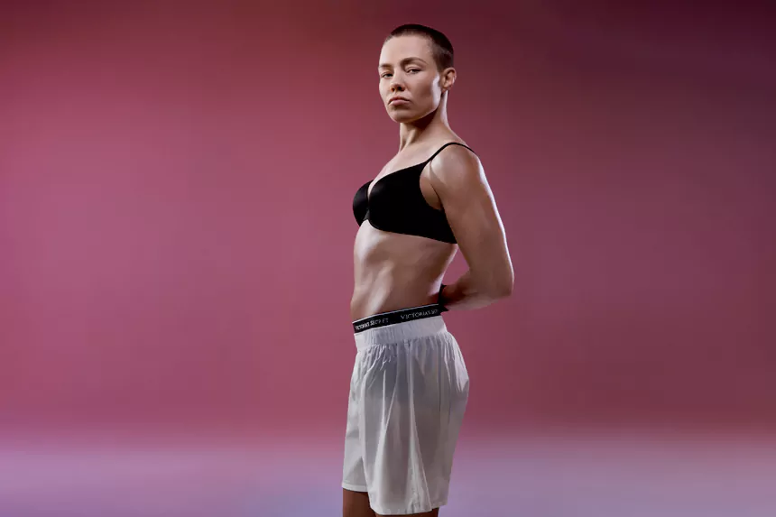 Rose Namajunas net worth - UFC fighter Rose Namajunas in fighting stance at a UFC event in 2025